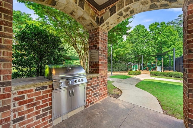 2317 Whiting Bay Cts NW, Kennesaw, GA 30152 - view of patio featuring an outdoor kitchen and a playground
