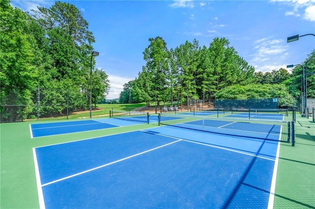 2317 Whiting Bay Cts NW, Kennesaw, GA 30152 - view of tennis court featuring view of wooded area