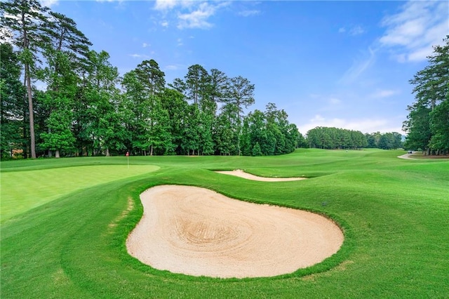2317 Whiting Bay Cts NW, Kennesaw, GA 30152 - surrounding community featuring view of wooded area, view of golf course, and a yard