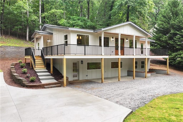 455 Sams Rd, Dawsonville, GA 30534 - view of front of home featuring stairs, a patio, a deck, and driveway