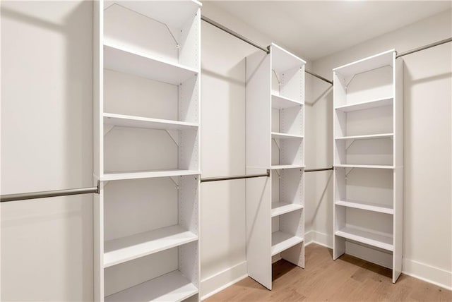 455 Sams Rd, Dawsonville, GA 30534 - spacious closet with wood finished floors