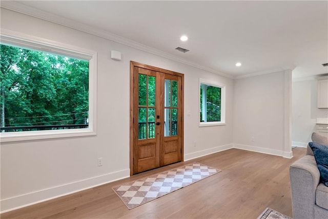 455 Sams Rd, Dawsonville, GA 30534 - foyer featuring light wood-style flooring, crown molding, baseboards, and recessed lighting