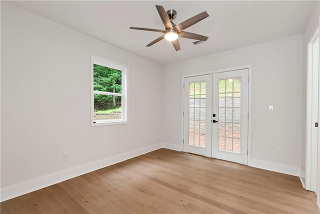 455 Sams Rd, Dawsonville, GA 30534 - unfurnished room with french doors, plenty of natural light, and baseboards