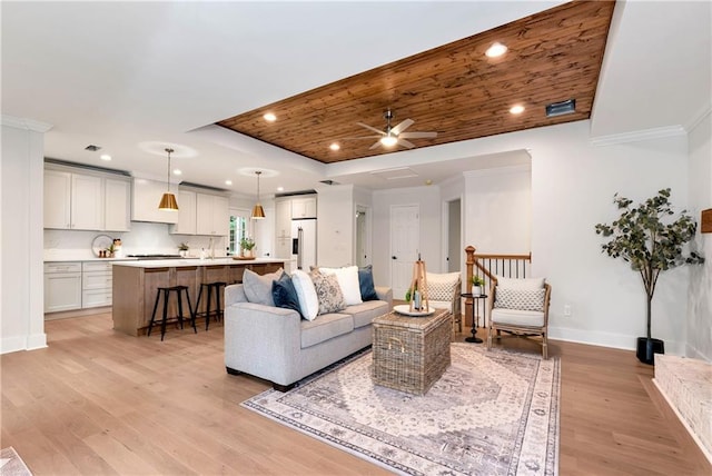455 Sams Rd, Dawsonville, GA 30534 - living room with a tray ceiling, light wood finished floors, baseboards, recessed lighting, and ceiling fan