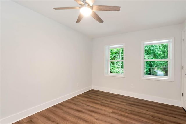 455 Sams Rd, Dawsonville, GA 30534 - spare room featuring baseboards, wood finished floors, and ceiling fan