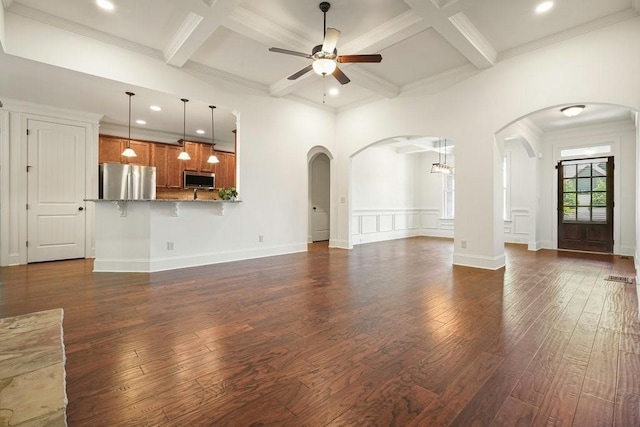 23 Durana Ct, Dallas, GA 30132 - unfurnished living room with a ceiling fan, dark wood finished floors, arched walkways, beamed ceiling, and coffered ceiling