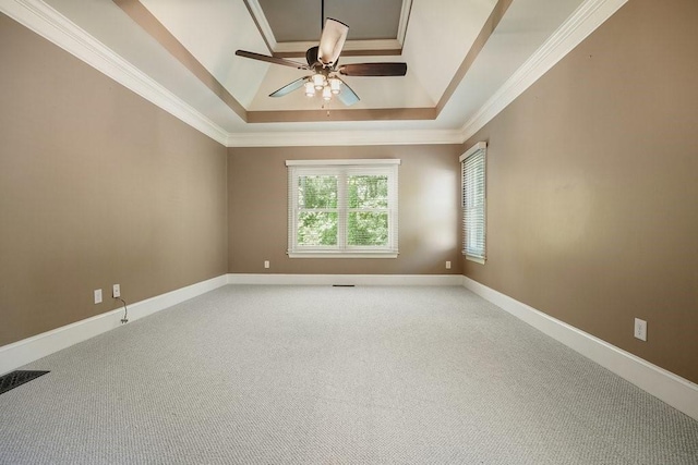 23 Durana Ct, Dallas, GA 30132 - spare room featuring a tray ceiling, ornamental molding, a ceiling fan, light carpet, and baseboards