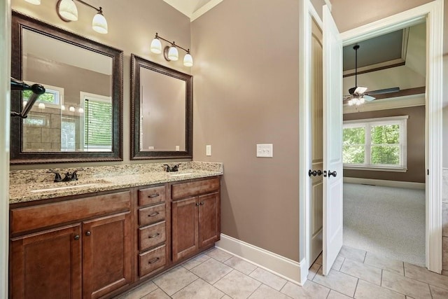 23 Durana Ct, Dallas, GA 30132 - full bath featuring baseboards, crown molding, double vanity, ceiling fan, and tile patterned flooring