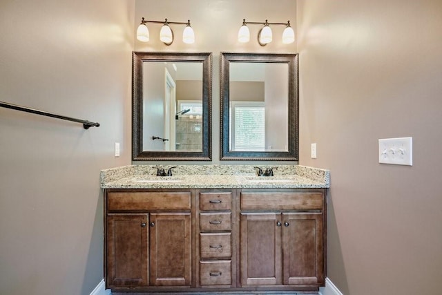 23 Durana Ct, Dallas, GA 30132 - bathroom featuring double vanity and baseboards