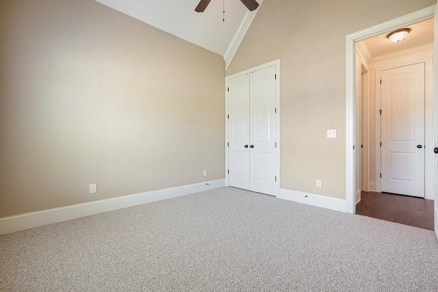 23 Durana Ct, Dallas, GA 30132 - unfurnished bedroom featuring carpet, lofted ceiling, baseboards, a closet, and a ceiling fan