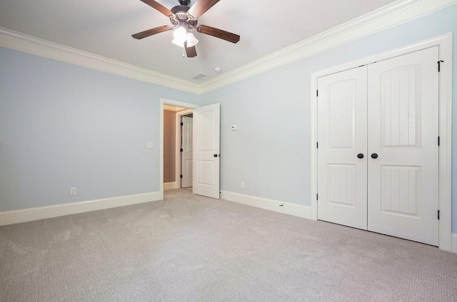 23 Durana Ct, Dallas, GA 30132 - unfurnished bedroom with crown molding, light carpet, a closet, baseboards, and ceiling fan