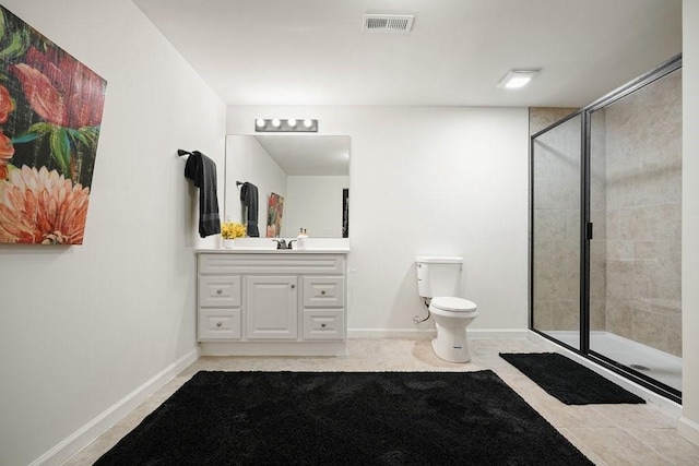 23 Durana Ct, Dallas, GA 30132 - bathroom featuring vanity, a shower stall, toilet, and baseboards
