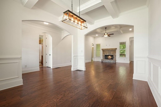 23 Durana Ct, Dallas, GA 30132 - unfurnished living room with a ceiling fan, coffered ceiling, beam ceiling, a decorative wall, and dark wood finished floors