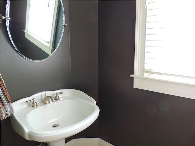 bathroom with plenty of natural light and a sink