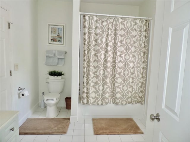 full bathroom with tile patterned flooring, toilet, and baseboards