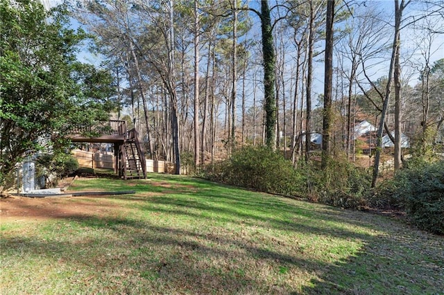 view of yard featuring a deck