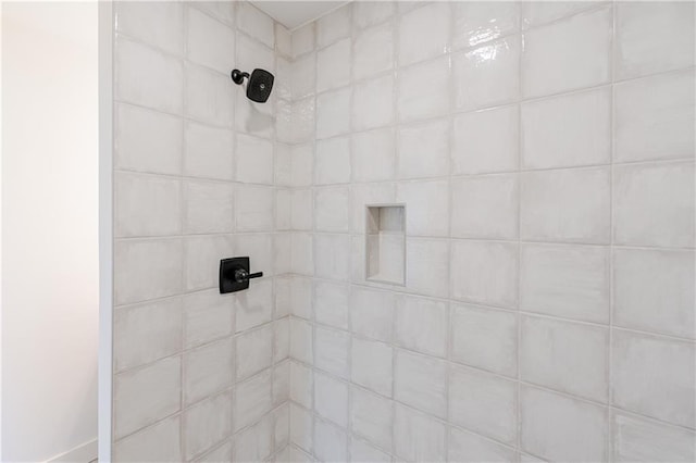 details featuring a tile shower