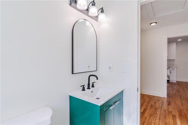 bathroom featuring vanity and hardwood / wood-style floors