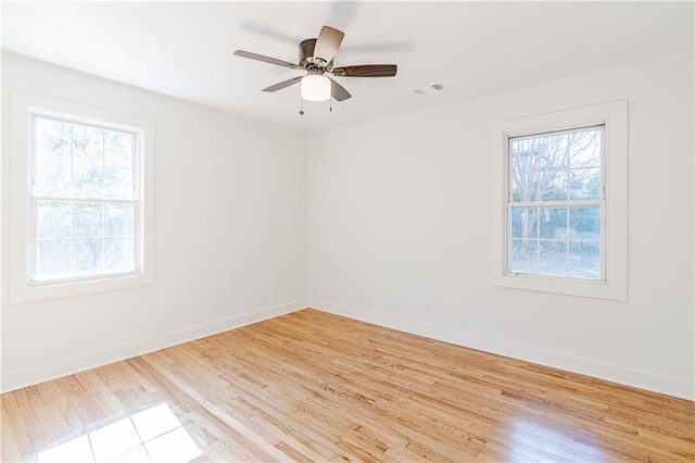 unfurnished room featuring ceiling fan and light wood-type flooring