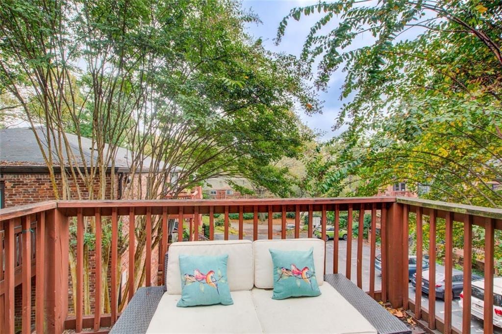 wooden deck featuring an outdoor hangout area