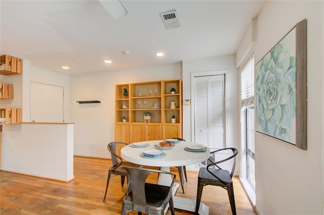 dining room featuring light hardwood / wood-style floors