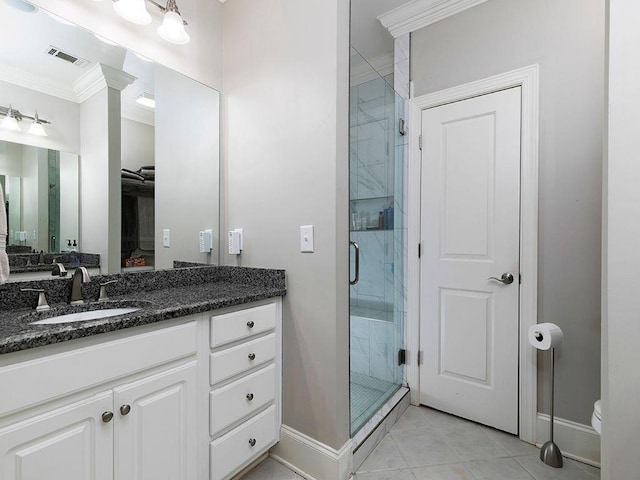 full bath with a stall shower, visible vents, vanity, and baseboards