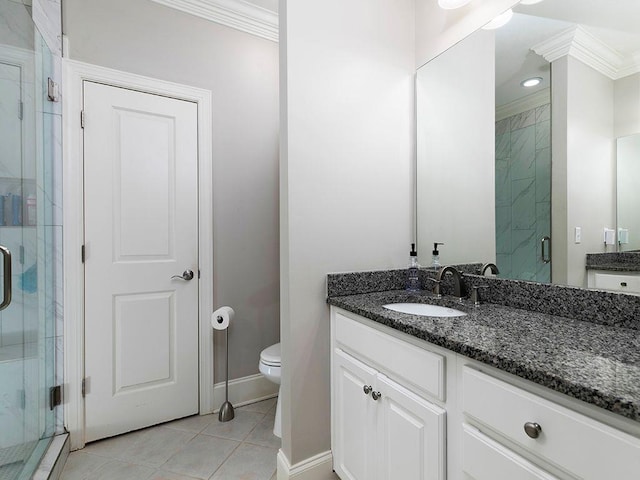 full bathroom featuring a stall shower, tile patterned flooring, crown molding, and vanity