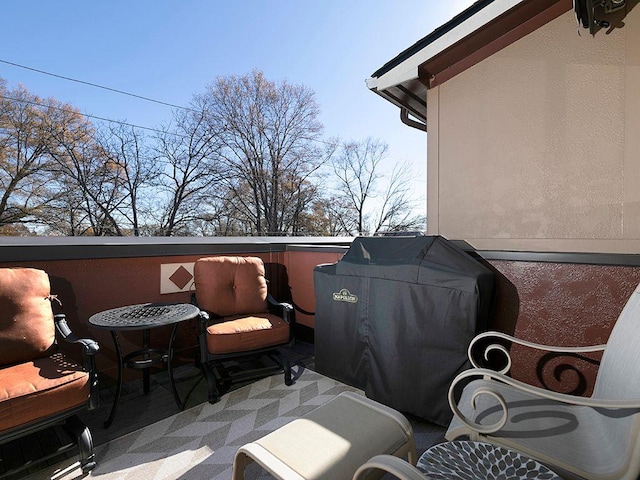 view of patio featuring a grill