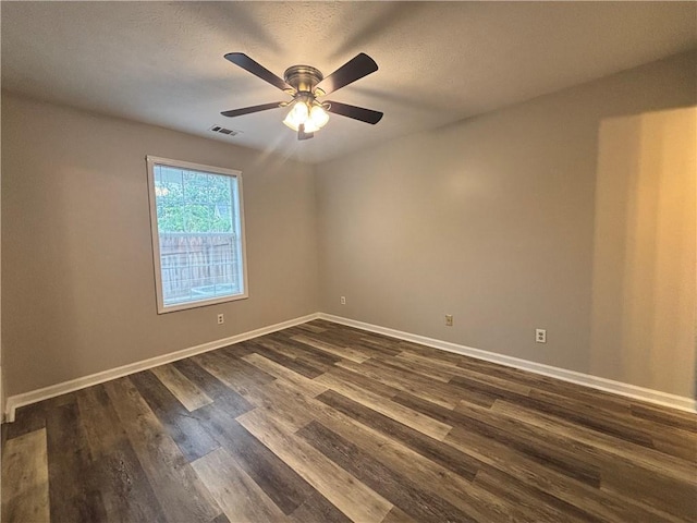 1822 Commonwealth Dr, Woodstock, GA 30188 - spare room with dark wood-style floors, baseboards, and a ceiling fan