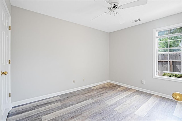 1822 Commonwealth Dr, Woodstock, GA 30188 - spare room featuring wood finished floors and ceiling fan