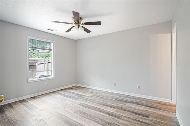1822 Commonwealth Dr, Woodstock, GA 30188 - empty room featuring wood finished floors and a ceiling fan