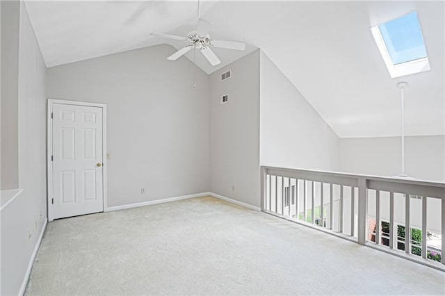 1822 Commonwealth Dr, Woodstock, GA 30188 - additional living space with a skylight, high vaulted ceiling, ceiling fan, and carpet floors