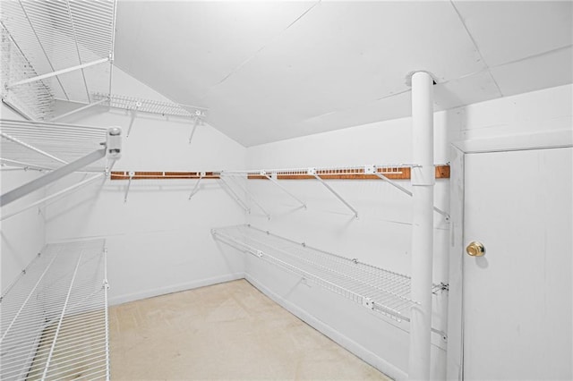 1822 Commonwealth Dr, Woodstock, GA 30188 - walk in closet featuring light colored carpet