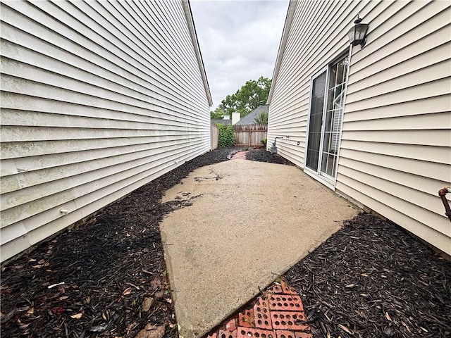 1822 Commonwealth Dr, Woodstock, GA 30188 - view of property exterior featuring a patio area