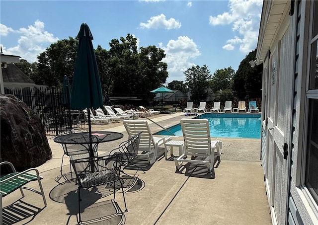 1822 Commonwealth Dr, Woodstock, GA 30188 - community pool with a patio area