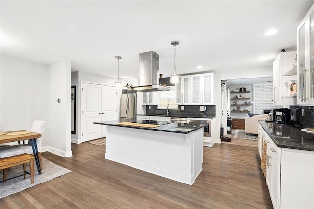 2572 Beverly Hills Dr, Chamblee, GA 30341 - kitchen with island range hood, appliances with stainless steel finishes, tasteful backsplash, a center island, and recessed lighting