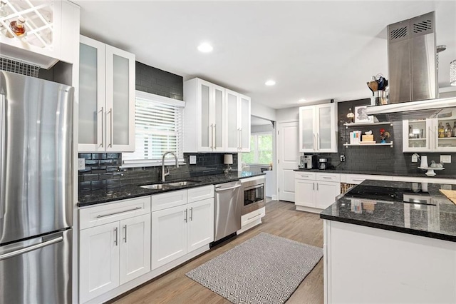 2572 Beverly Hills Dr, Chamblee, GA 30341 - kitchen with appliances with stainless steel finishes, a sink, decorative backsplash, white cabinets, and dark stone countertops