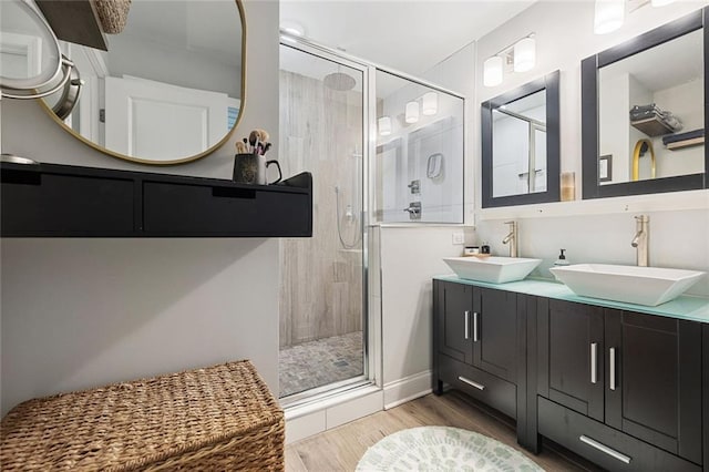 2572 Beverly Hills Dr, Chamblee, GA 30341 - full bath featuring a shower stall, wood finished floors, and double vanity