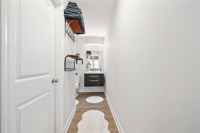 2572 Beverly Hills Dr, Chamblee, GA 30341 - corridor featuring wood finished floors and baseboards