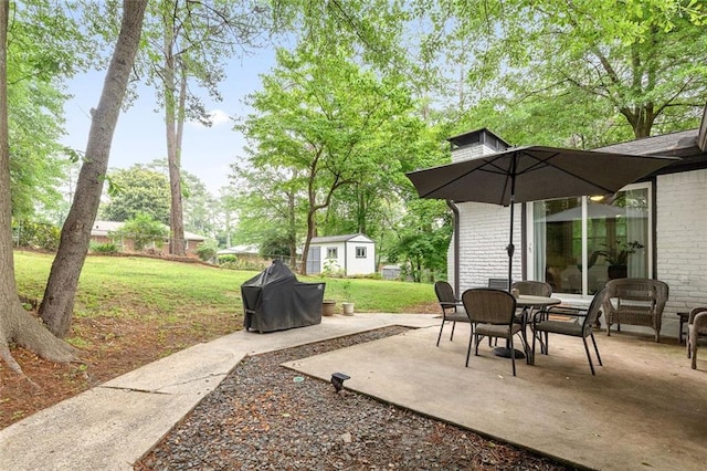 2572 Beverly Hills Dr, Chamblee, GA 30341 - view of patio with an outbuilding