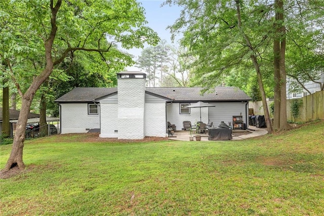 2572 Beverly Hills Dr, Chamblee, GA 30341 - back of property with a patio area, crawl space, a chimney, and brick siding