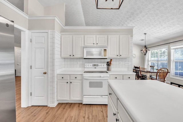 2780 Matlin Way, Buford, GA 30519 - kitchen with white appliances, light wood-style floors, light countertops, white cabinetry, and a textured ceiling