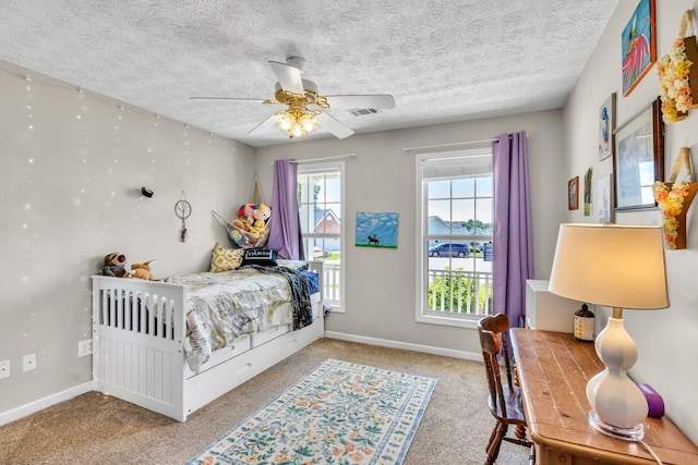 2780 Matlin Way, Buford, GA 30519 - carpeted bedroom featuring a textured ceiling, a ceiling fan, and baseboards
