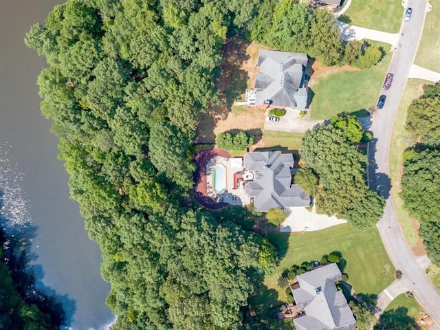 drone / aerial view with a water view