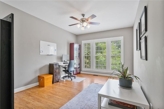 1775 Porterton Way, Cumming, GA 30041 - office with wood finished floors and a ceiling fan