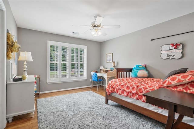 1775 Porterton Way, Cumming, GA 30041 - bedroom featuring wood finished floors and a ceiling fan