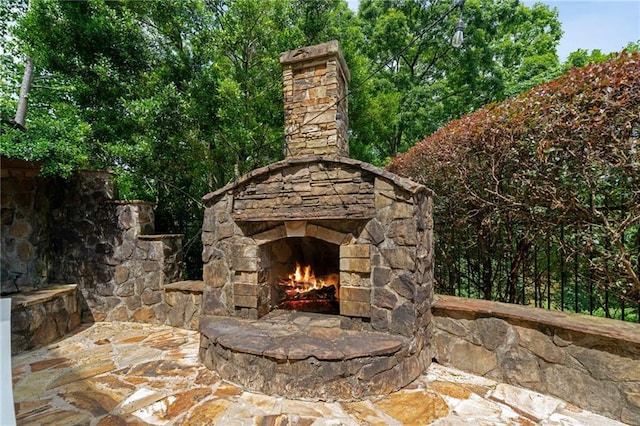 1775 Porterton Way, Cumming, GA 30041 - view of patio featuring an outdoor stone fireplace