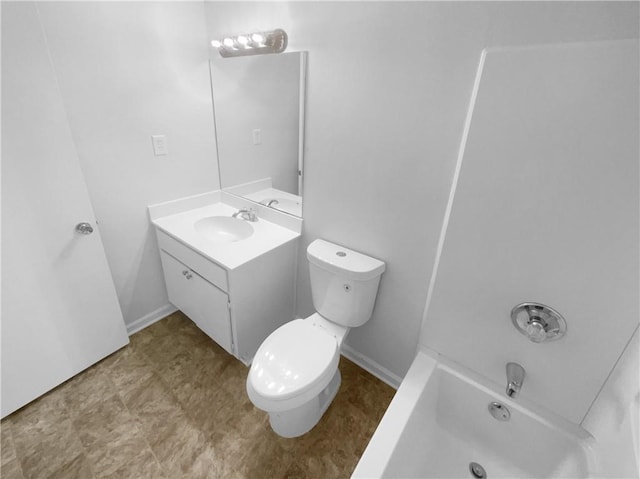 full bathroom with toilet, vanity, bathtub / shower combination, and baseboards