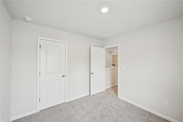 2770 Aralynn Way, College Park, GA 30337 - unfurnished bedroom featuring carpet flooring and baseboards