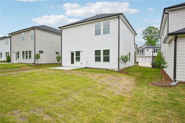 2770 Aralynn Way, College Park, GA 30337 - back of house with a yard and a patio area